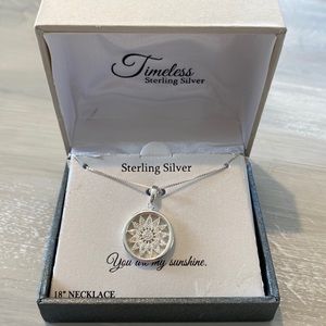 Sterling silver flower necklace.